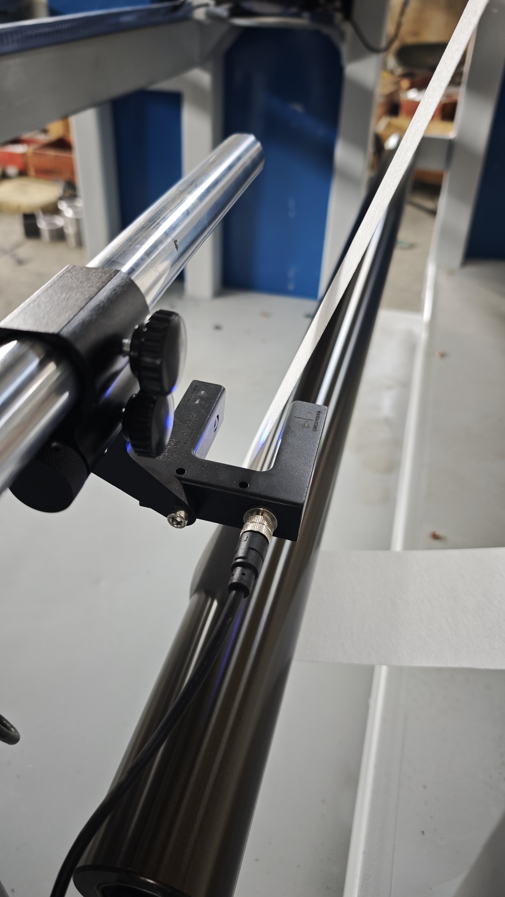 Automatic web guiding module for specialty film
